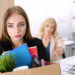 45107583 - boss dismissing an employee. dejected fired office worker carrying a box full of belongings.