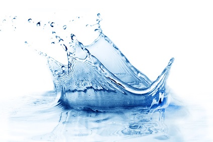 Fresh clean water splash in blue.