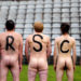 SENSITIVE MATERIAL. THIS IMAGE MAY OFFEND OR DISTURB    Naked footballers, who have letters written on their back which form the word "Ass", are seen before Germany v Netherlands soccer match in protest against what they say is increasing commercialization of professional football, in Wuppertal, Germany September 6, 2020. REUTERS/Leon Kuegeler