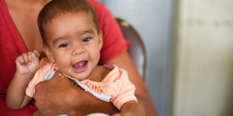 Thaiddy Flores and her daughter Jaidels Flores 8 months old is feed with therapeutic food for malnutrition by a Unicef volunteer during a day with the children of Venenzuela where WASH, education, health, nutrition and recreation activities take place in Negro Primero 1 school in Caucaguita, Miranda, on June 29, 2019. 

Since April 2019, within the framework of the Communication for Development strategy in Venezuela, UNICEF is holding the "Jornada #ConLosNiñosDeVenezuela", activity in conjunction with partners and allies, which have been carried out in Caracas, Miranda y Táchira , where the following activities have been implemented: Services for the protection of children, Girls and Adolescents, Children's Space for Children with Storytelling, Workshop on Self-Protection in Earthquakes, Recreational Activities with the use of "RIESGOLANDIA", Information and Support Point "Safe Route Orientation", Talk about the first 1000 days of life of the newborn, Hygiene Services (Hand washing and delivery of water purification tablets). More than 1700 children have been benefited in Miranda.
