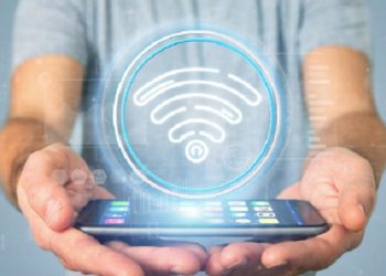 View of Businessman holding Wifi icon with stats and binary code 3d rendering