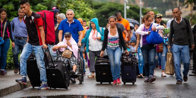 As of June 7, an estimated 4 million people have left Venezuela since the economic and political crisis began in 2014, the United Nations Refugee Agency says. The Simon Bolivar International Bridge between San Antonio, Venezuela and Villa del Rosario, Colombia is one of the two bridges where as many as 70 percent of all people who leave Venezuela for good cross into Colombia. This bridge re-opened to all foot traffic last Saturday, June 8, after being closed for about four months. It had been restricted to the elderly, students who attend school in and people who had medical appointments in Colombia. Many people ended up using illegal crossings along the river bank. Local gangs eventually started charging fees to cross, making the trek more risky and expensive. each day to shop for goods they can’t find or afford in Venezuela. SUMMARY: Photos from World Vision US President Edgar Sandoval Sr.’s visit to the Venezuela Migration Crisis affecting Cucuta, Colombia. Thousands of Venezuelans cross into Colombia each day, commuting for school, work, shopping, or leaving for good. While most return to the homes just across the border in Venezuela, as many as 5,000 remain in Colombia, walking for days or taking buses to far-away places like Bogota, Ecuador, or Peru.