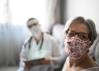 Portrait of senior patient on medical consultation at her house