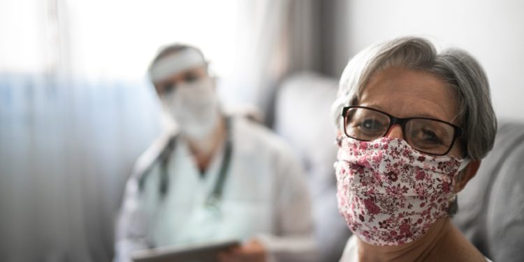Portrait of senior patient on medical consultation at her house