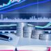 Stack of money coin with trading graph. financial investment concept use for background.