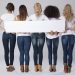 Girls in jeans holding empty banner