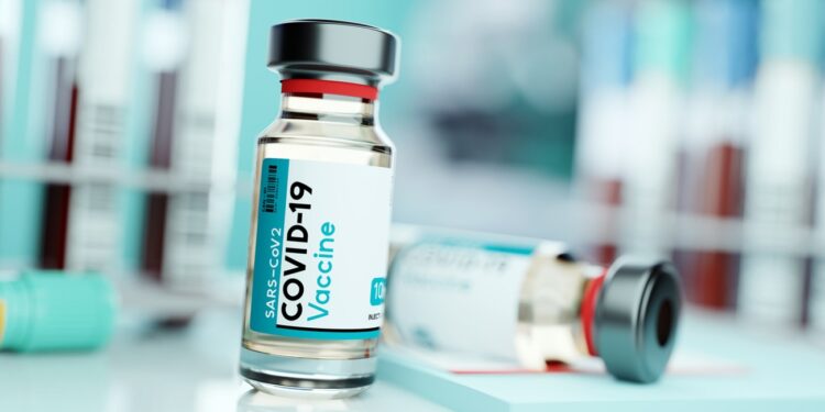 A vial of SARS-CoV2 COVID-19 vaccine in a medical research and development laboratory. Science 3D illustration.