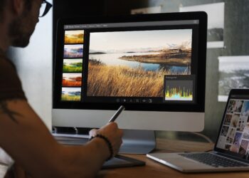 Man editing photos on a computer