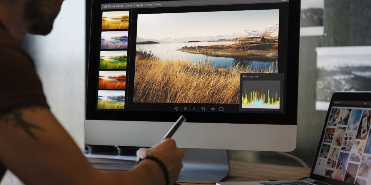 Man editing photos on a computer