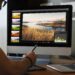 Man editing photos on a computer