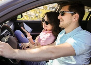 Travel. Couple is traveling in the car