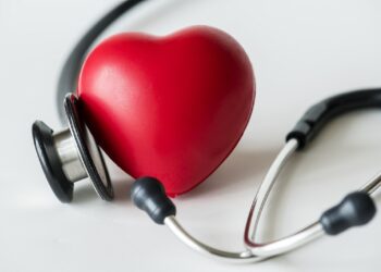 Closeup of heart and a stethoscope cardiovascular checkup concept