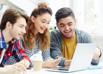 Happy learners video chatting with friends online