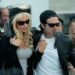 Pam & Tommy -- Set in the Wild West early days of the Internet, “Pam & Tommy” is based on the incredible true story of the Pamela Anderson (Lily James) and Tommy Lee (Sebastian Stan) sex tape. Stolen from the couple’s home by a disgruntled contractor (Seth Rogen), the video went from underground bootleg-VHS curiosity to full-blown global sensation when it hit the Web in 1997. A love story, crime caper and cautionary tale rolled into one, the eight-part original limited series explores the intersection of privacy, technology and celebrity, tracing the origins of our current Reality TV Era to a stolen tape seen by millions but meant to have an audience of just two. Pam (Lily James) and Tommy (Sebastian Stan), shown. (Photo by: Erin Simkin/Hulu)