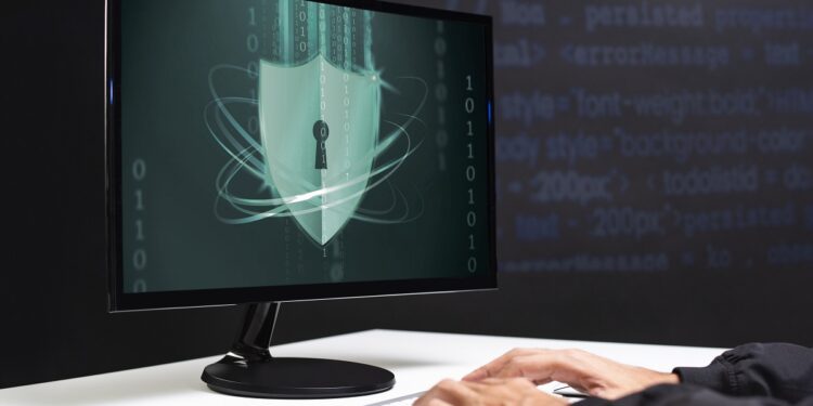 Hacker cracking the binary code data security