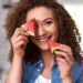 Young woman with a slice of watermelon