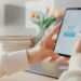 Young asia lady use cellphone order online shopping product and paying bills with banking app with transaction successful. Stay at house, Quarantine activity, Fun activity for coronavirus prevention.