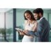 Shot of a young businessman and businesswoman using a digital tablet together in an office