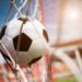 Soccer into goal success concept