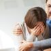 Image of compassionate psychiatrist comforting her crying patient