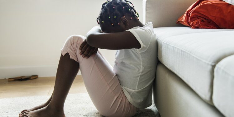 Black girl with sadness emotion