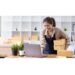 Young smiling beautiful owner asian woman freelancer sme business online shopping working on laptop computer with parcel box at home - SME business online and delivery concept.
