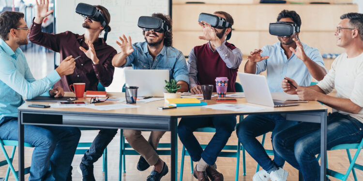 Group of men testing virtual reality headsets