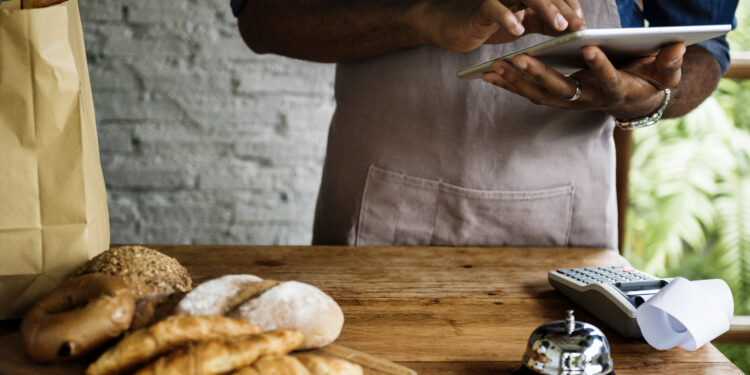 Men Checking Stock of Pastry in Bakery Shop