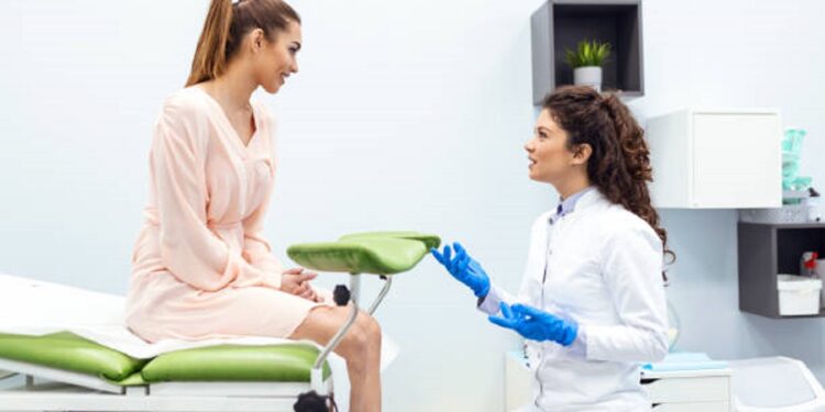 Gynecologist consultation, women's health treatment and diagnosis of diseases of the reproductive system. Checking the female health, exam ovaries, and uterus in the gynecology office.