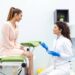 Gynecologist consultation, women's health treatment and diagnosis of diseases of the reproductive system. Checking the female health, exam ovaries, and uterus in the gynecology office.