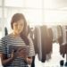 Shot of a boutique owner using a digital tablet with a customer blurred in the backgroundhttp://195.154.178.81/DATA/i_collage/pu/shoots/806285.jpg