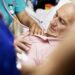 NPSNewProduction, UK, England, hospitals, medical, medical occupations, medical care, examinations, nurses, stethoscopes, auscultating, auscultate, listening, heart, heartbeat