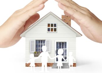 holding house representing home ownership