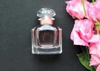 front view perfume bottle with pink roses