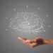 brain writes with white chalk is on hand, draw concept.