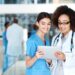 Shot of two medical practitioners using a digital tablet together in a hospital