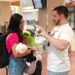 Clayton tearfully presents a custom coffee mug to Anali at the airport in Kentucky.