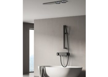 Modern bathroom interior with white bathtub, shampoo table, panoramic window. Room designed in eco minimalist style. Mock up wall space. No people. 3D Rendering