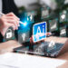 Business and AI, Artificial intelligence technology, and daily life, World technology concept, Businesswomen use laptops with AI application, Modern thinking with technology Help solve work problems.