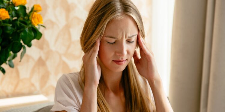 Headache of woman, head pain and stress or depression concept.