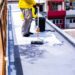 Painted gray flooring on fiber glass with paint rollers for waterproof, reinforcing net, Repairing waterproofing deck flooring.