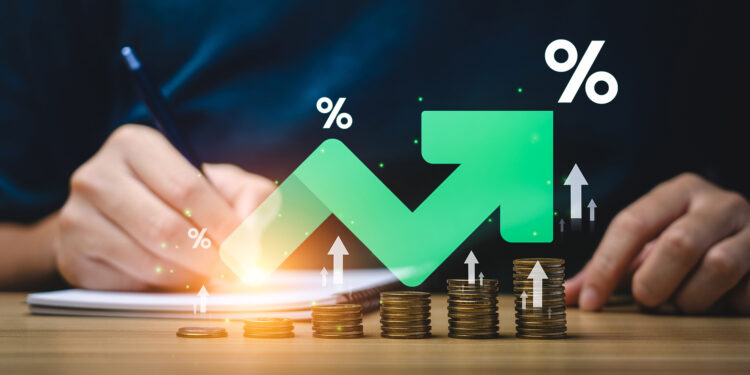 Interest rate and dividend concept, Businessman is calculating income and return on investment in percentage. income, return, retirement, compensation fund, investment, dividend tax, stock market
