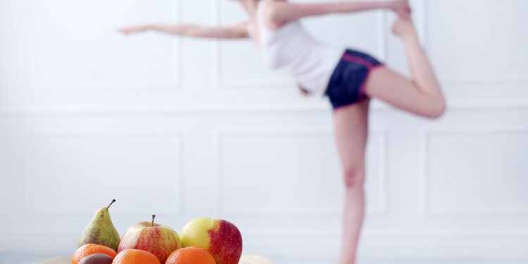 Lifestyle. Cute, attractive woman during yoga exercise