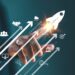 Growth strategy busines trend concept. Businessman hand on arrow investment icon. Increase sale marketing, increase success potential, soar rocket towards wealth. Competitive business goal plan