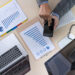 analyzing the work Accounting on Laptop investment concept.