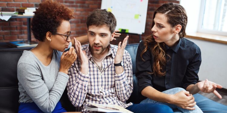Colleagues communicating, argueing during business brake at the office