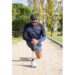 Sporty man with artificial leg getting ready for jog. Man in sport clothes stretching legs in park on summer day. Sport, training, wellbeing concept