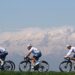SALASSA ITALY - MARCH 13: (L-R) Tom Paquot of Belgium and Team Intermarche - Wanty, Julien Simon of France and Valentin Ferron of France and Team TotalEnergies compete with the Alps in the background during the 105th Milano-Torino 2024 a 177km one day race from Rho to Salassa 346m on March 13, 2024 in Salassa, Italy. (Photo by Dario Belingheri/Getty Images)