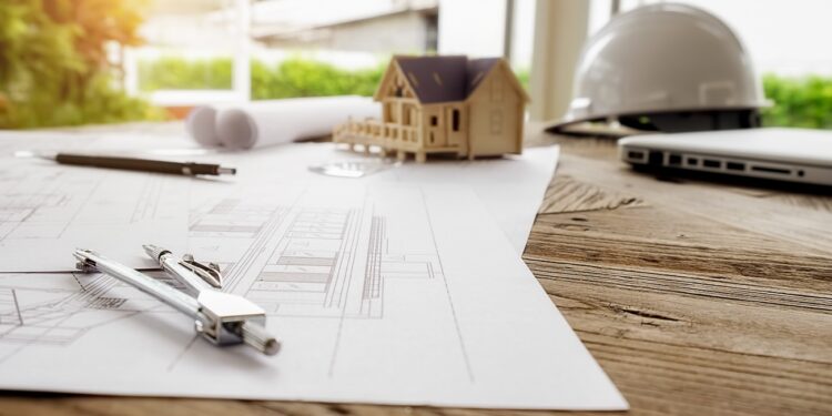 Image of engineering objects on workplace top view.Construction concept. Engineering tools.Vintage tone retro filter effect,soft focus(selective focus)