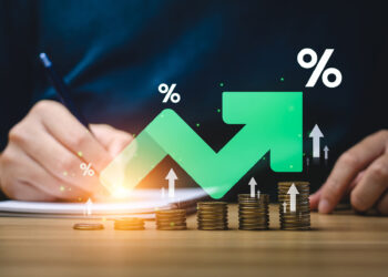 Interest rate and dividend concept, Businessman is calculating income and return on investment in percentage. income, return, retirement, compensation fund, investment, dividend tax, stock market